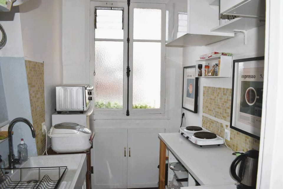 Kitchen or kitchenette, oven, stove, toaster