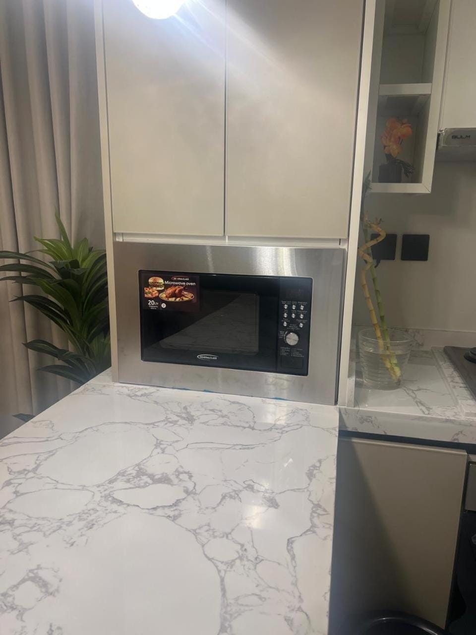 Kitchen or kitchenette, microwave