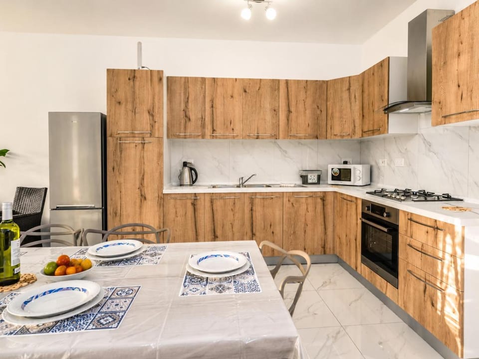 Dining area, microwave, oven, kitchen