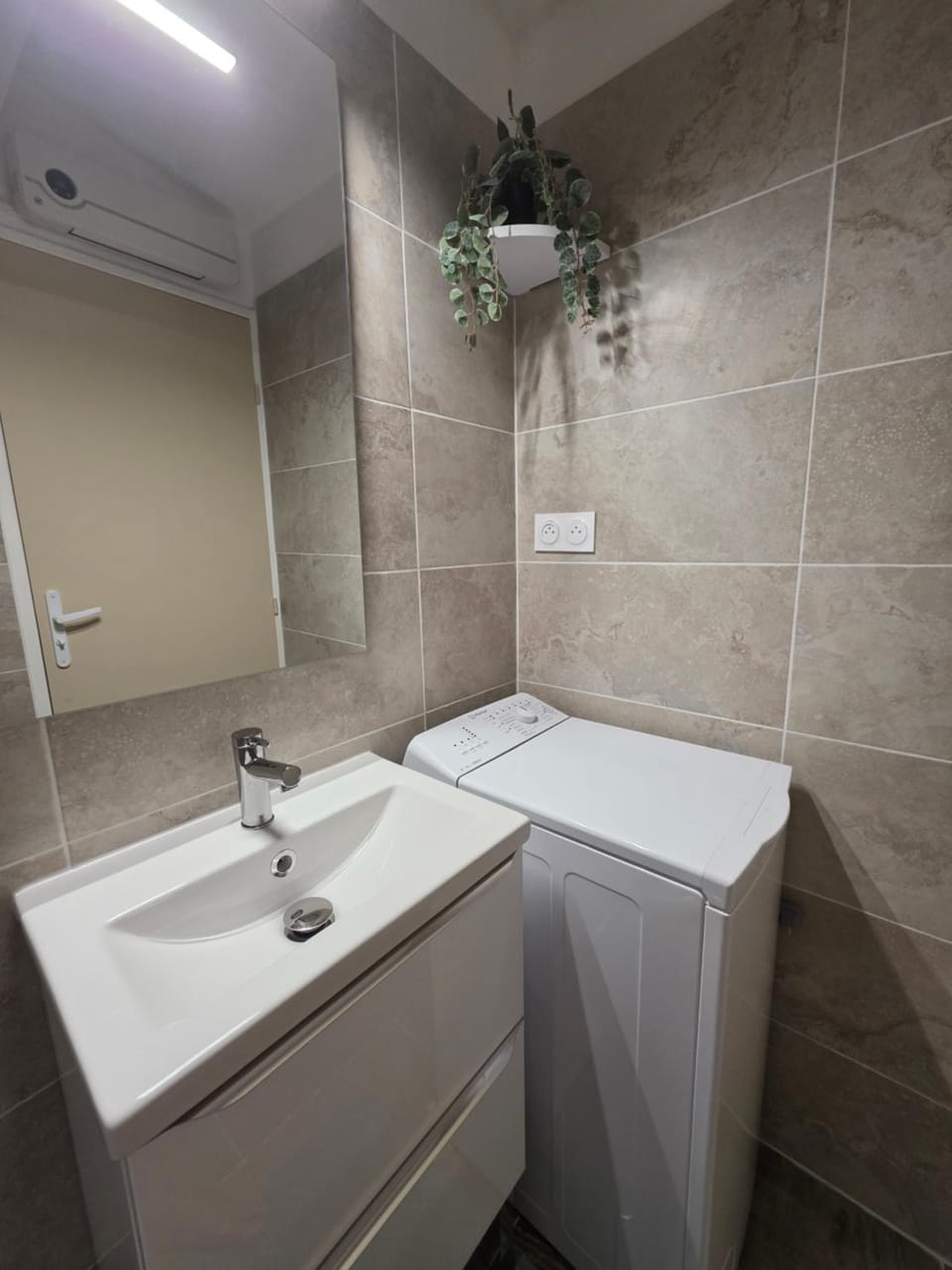 Shower, Bathroom, hair dryier, towels, washing machine