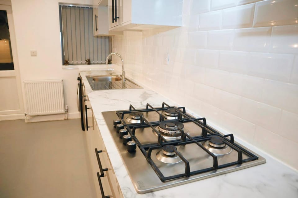 Kitchen or kitchenette, stove