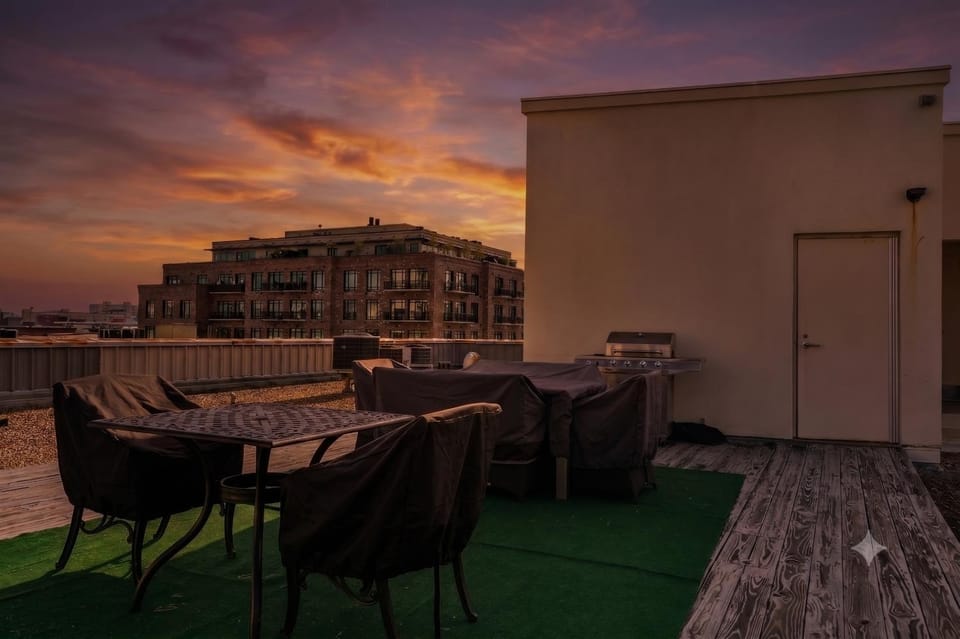Exposed brick condo steps from WWII Museum Apartment in Warehouse District