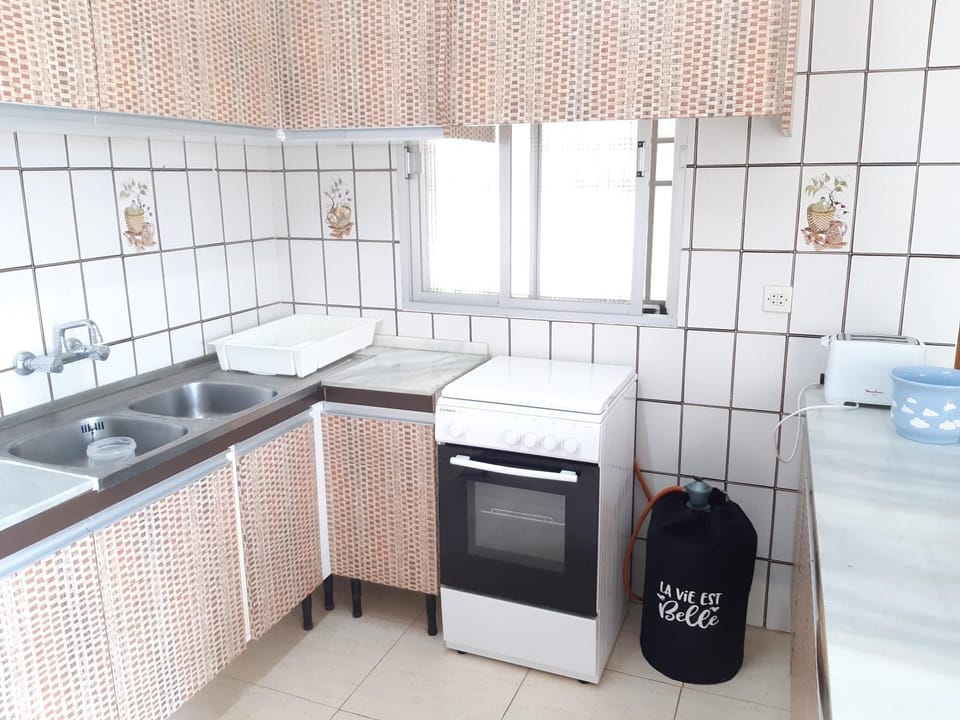 Kitchen or kitchenette, oven, stove