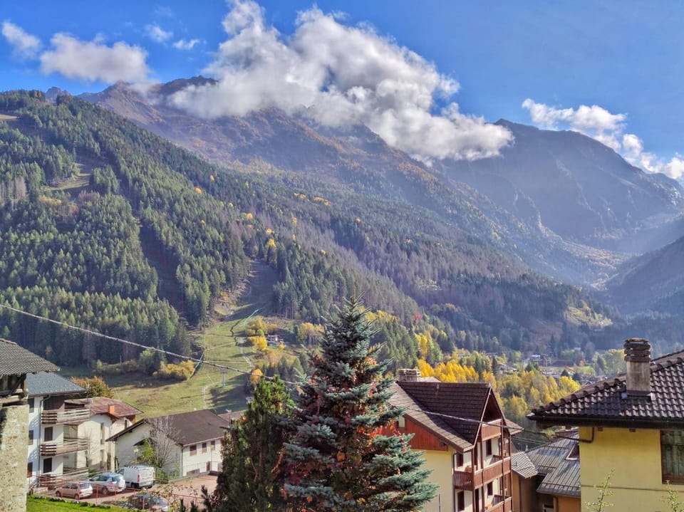 Property building, Nearby landmark, Spring, Day, Natural landscape, Mountain view