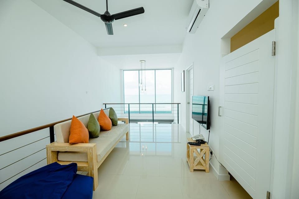 Communal lounge/ TV room, Living room, Seating area, air conditioner