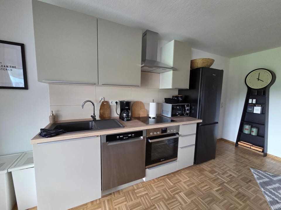 Kitchen or kitchenette, dishwasher, oven, stove, toaster