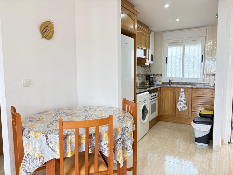 Dining area, oven, washing machine