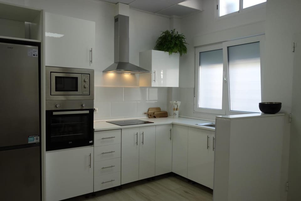 Kitchen or kitchenette, oven, stove