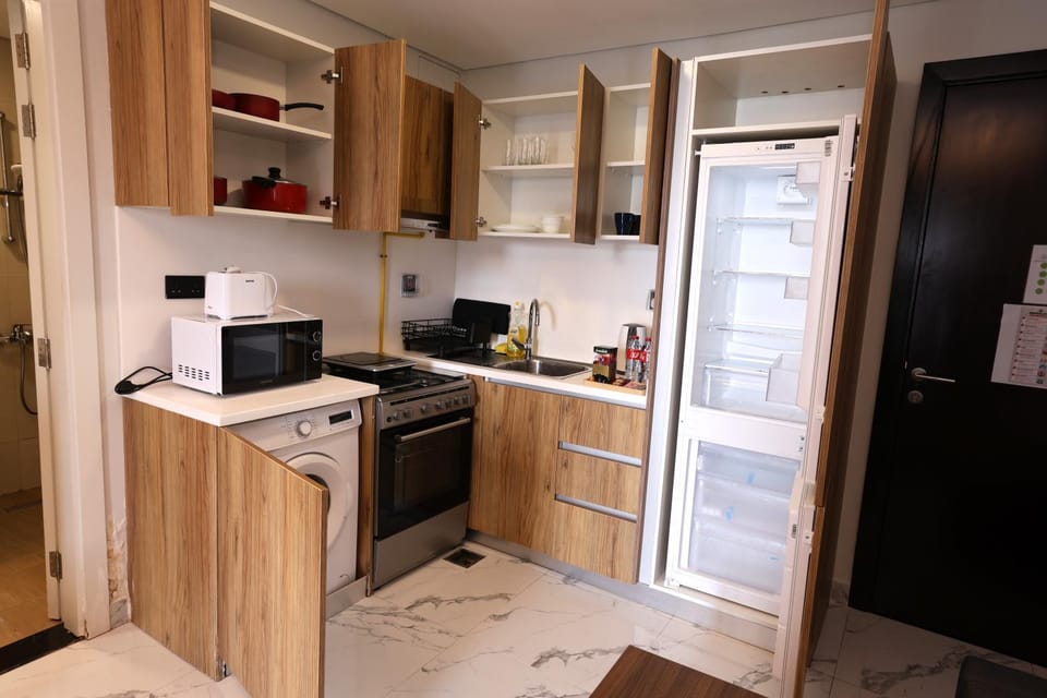 Kitchen or kitchenette, washing machine