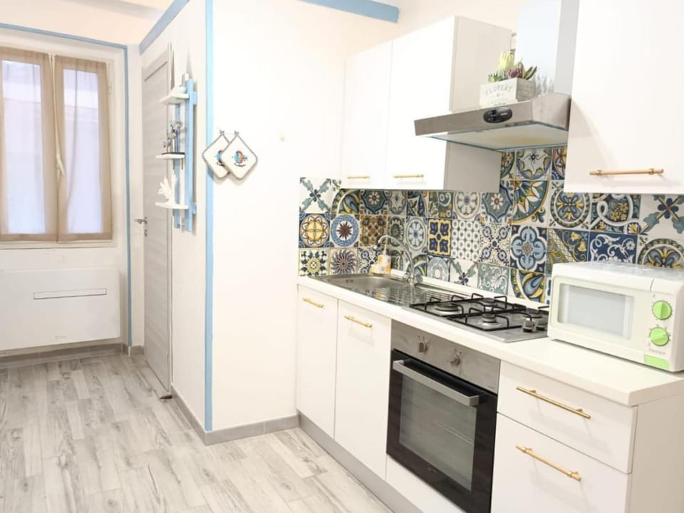 Kitchen or kitchenette, stove