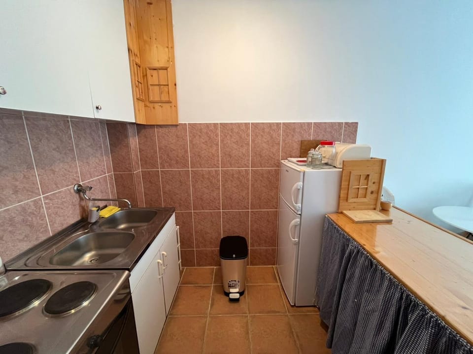 Kitchen or kitchenette, stove