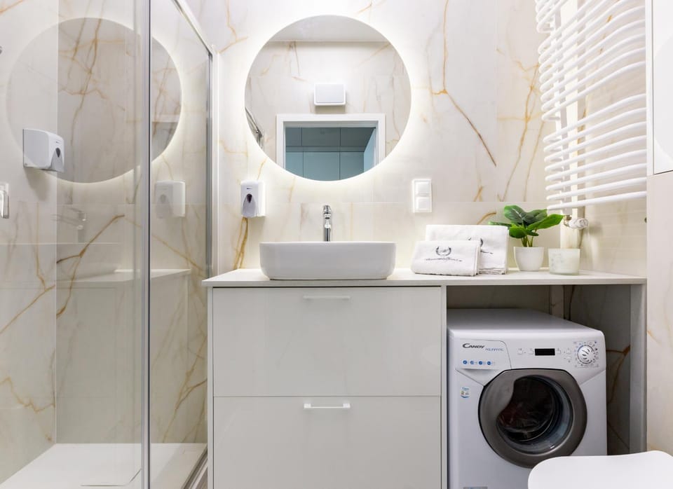 Shower, Toilet, Bathroom, towels, washing machine, dryer