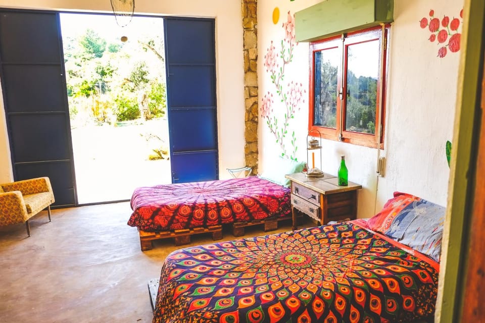 WILDSPIRIT Bedroom in Permaculture Paradise at WILDSPIRIT Eco Cultural Farm Farm Stay in Baix Maestrat