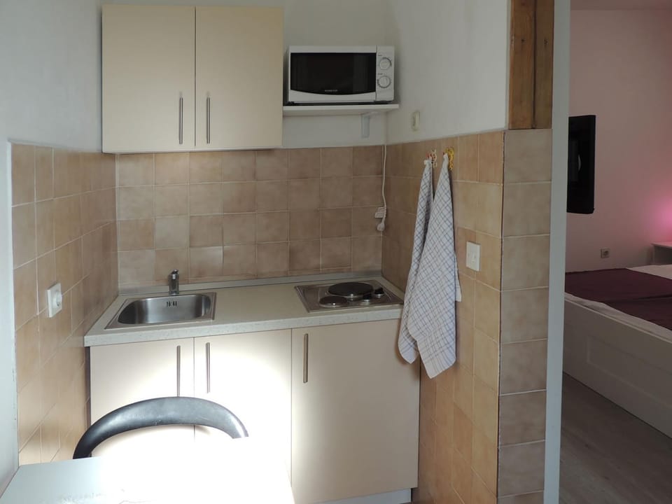 Kitchen or kitchenette, stove