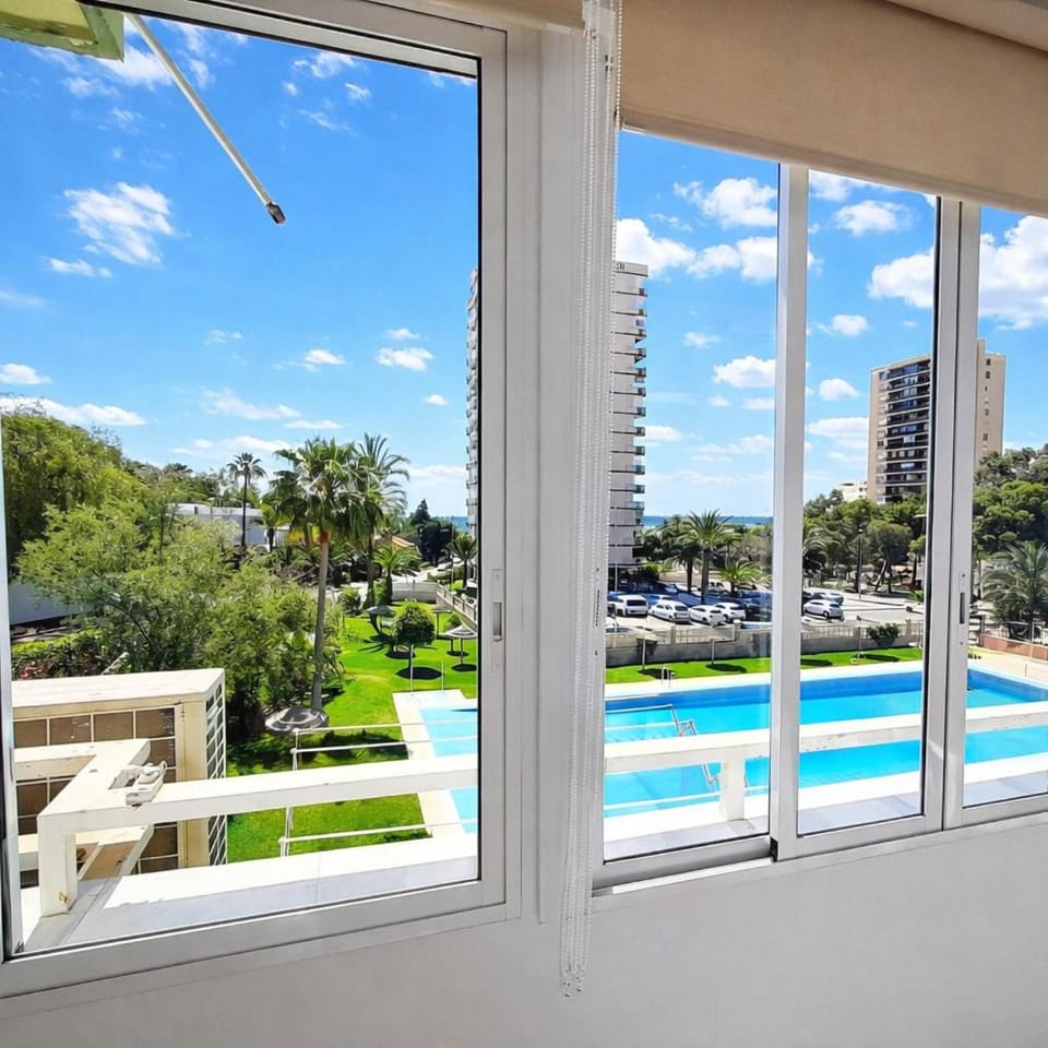Property building, Day, View (from property/room), Swimming pool