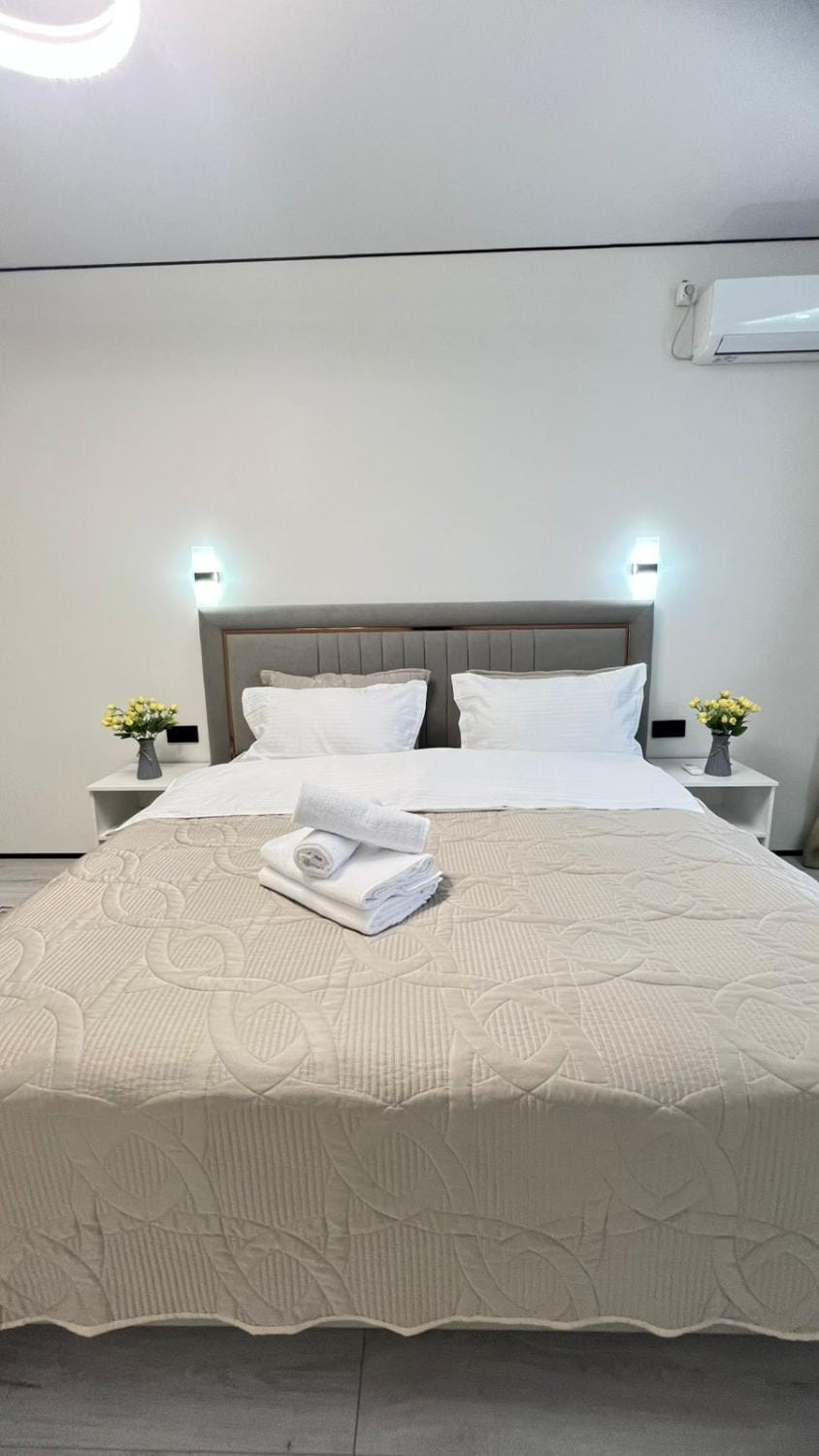 Bed, Photo of the whole room, Bedroom, towels, air conditioner