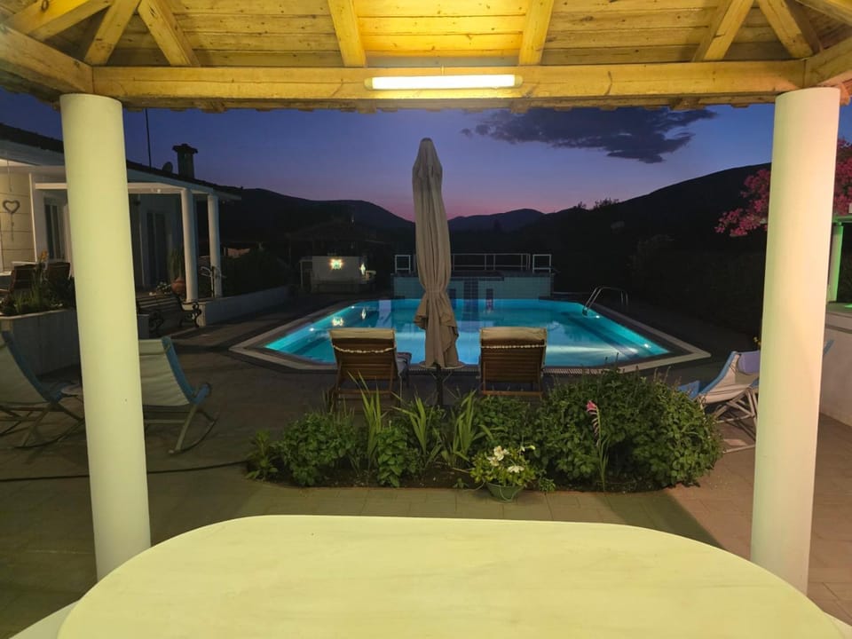Patio, Night, Natural landscape, Mountain view, Pool view, Swimming pool, sunbed