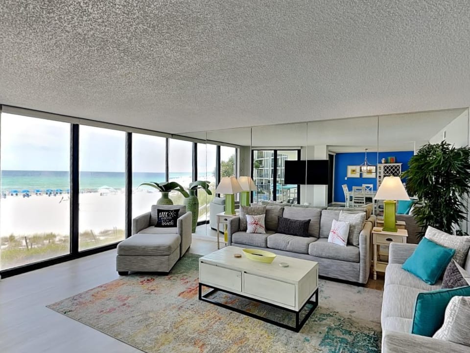 TV and multimedia, View (from property/room), Living room, Seating area, Beach, Sea view, furniture