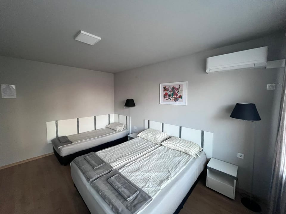 Bed, Photo of the whole room, Bedroom, towels, air conditioner