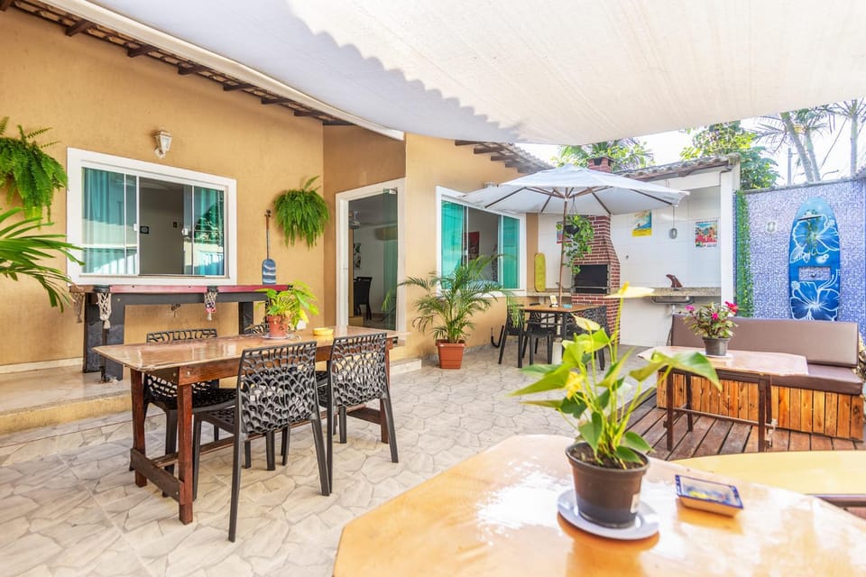 Property building, Patio, Day, Garden, Living room, Seating area, Dining area