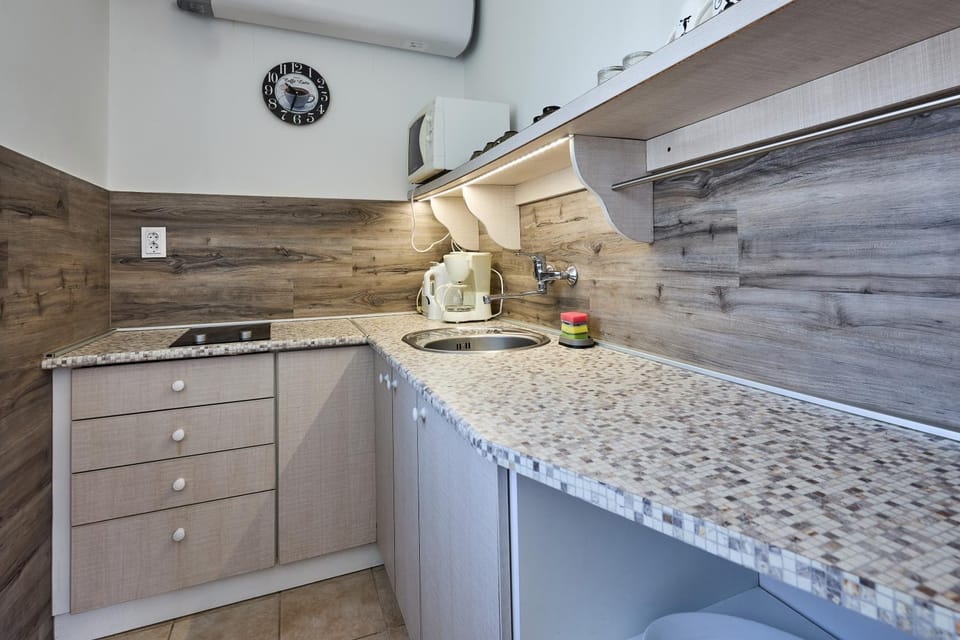 Kitchen or kitchenette, stove