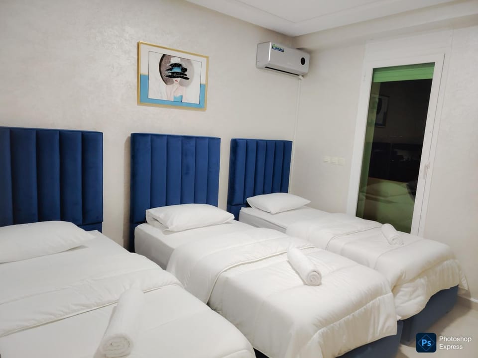 Bed, Photo of the whole room, Bedroom, towels, air conditioner
