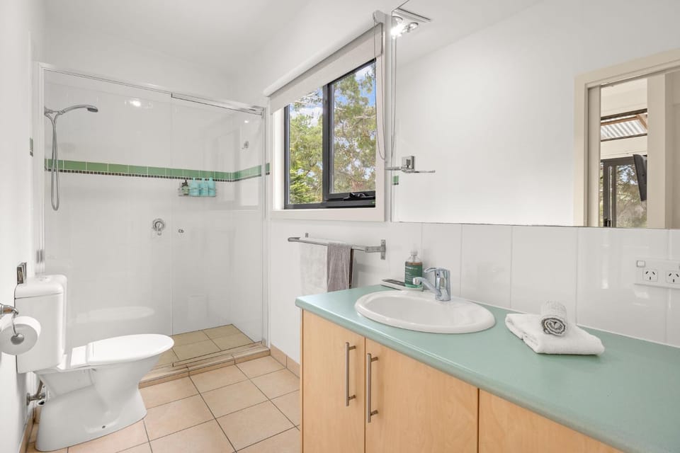 Shower, Toilet, Bathroom, hair dryier, towels