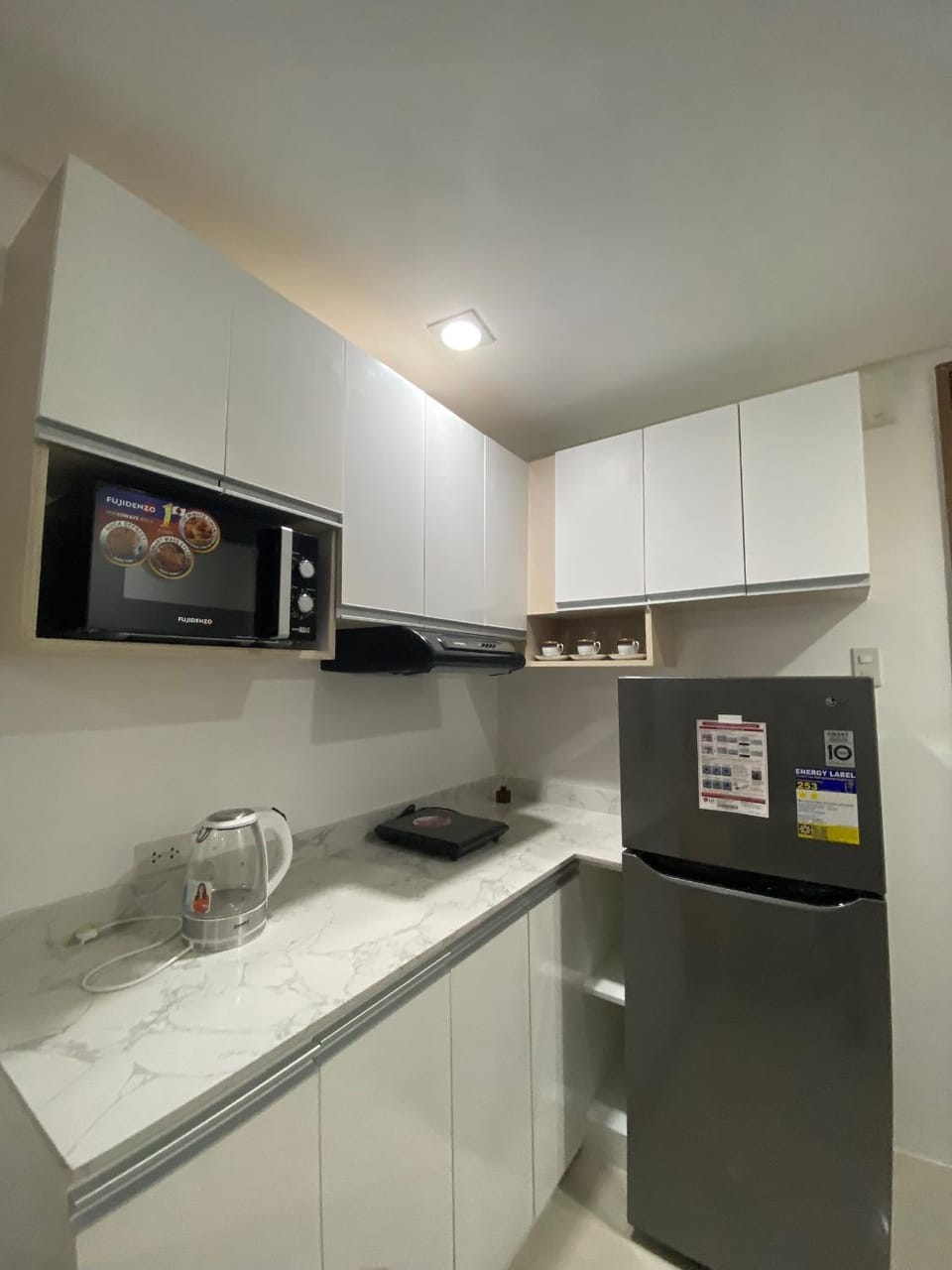 Kitchen or kitchenette, stove