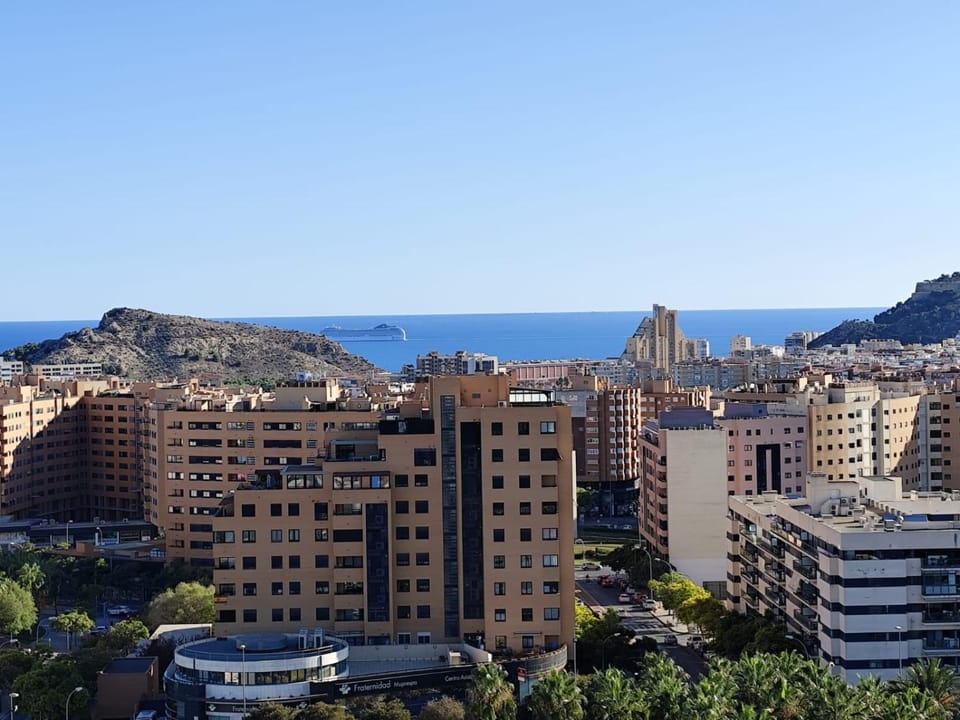 Property building, Day, Natural landscape, City view, Mountain view, Sea view