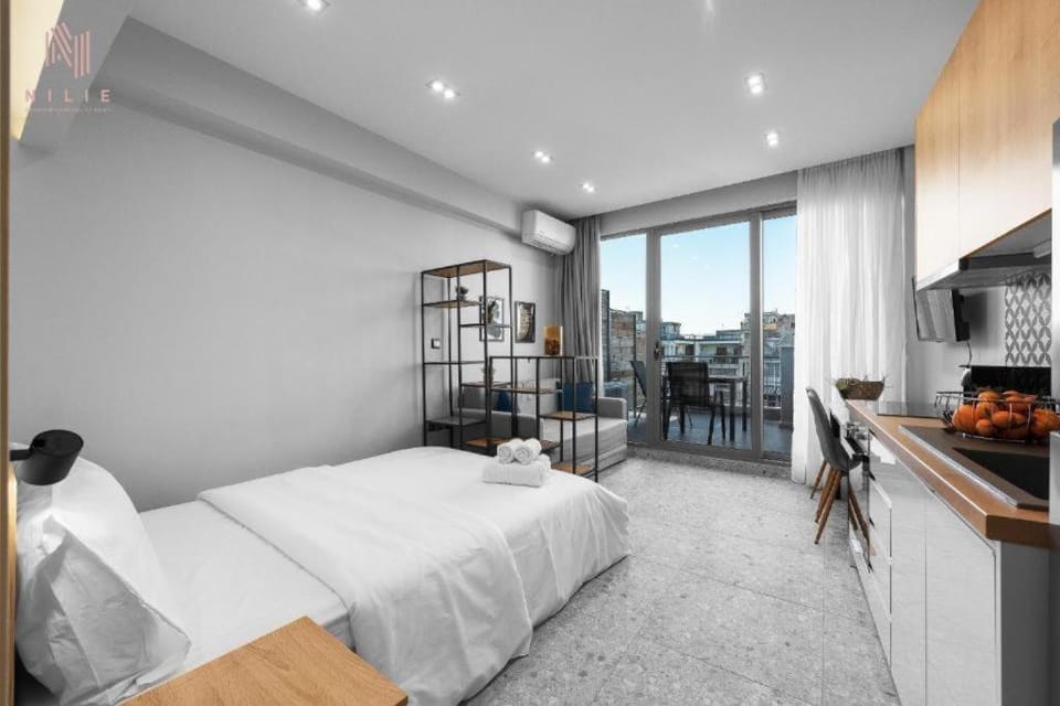 Bed, Kitchen or kitchenette, Living room, Seating area