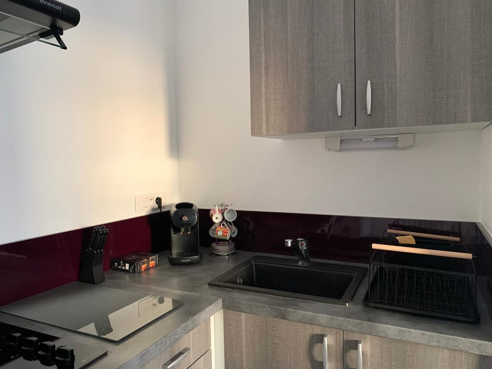 Kitchen or kitchenette, stove, toaster