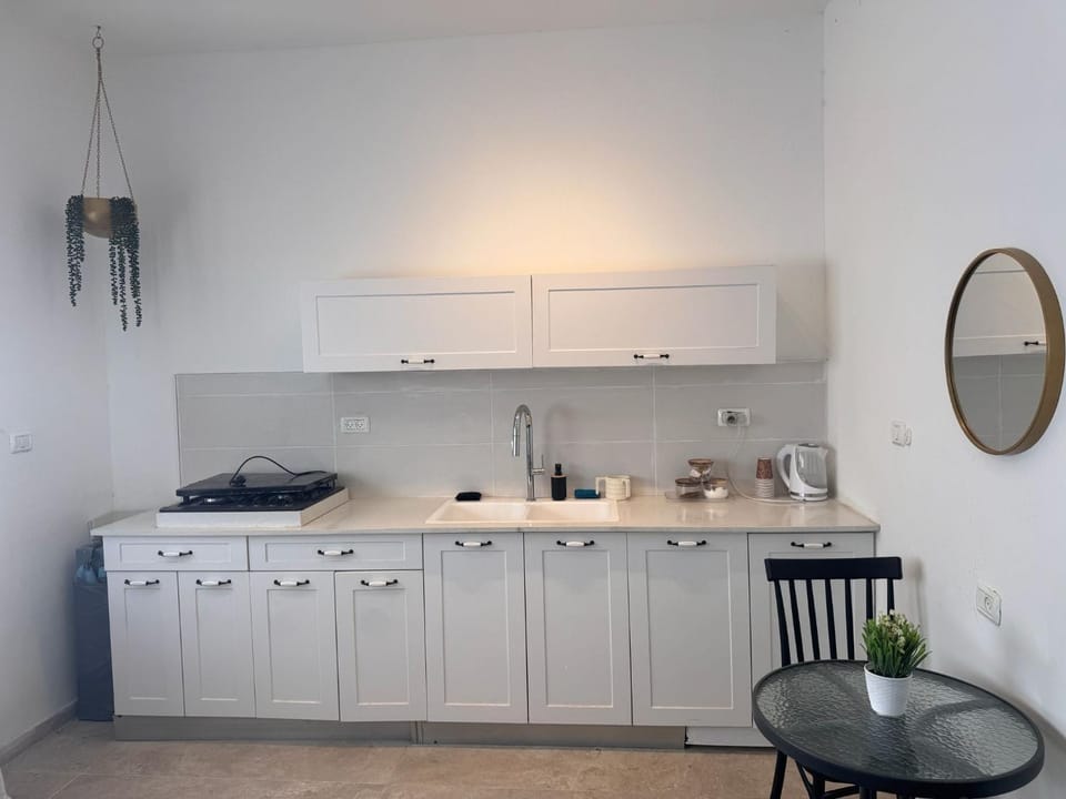 Kitchen or kitchenette, stove
