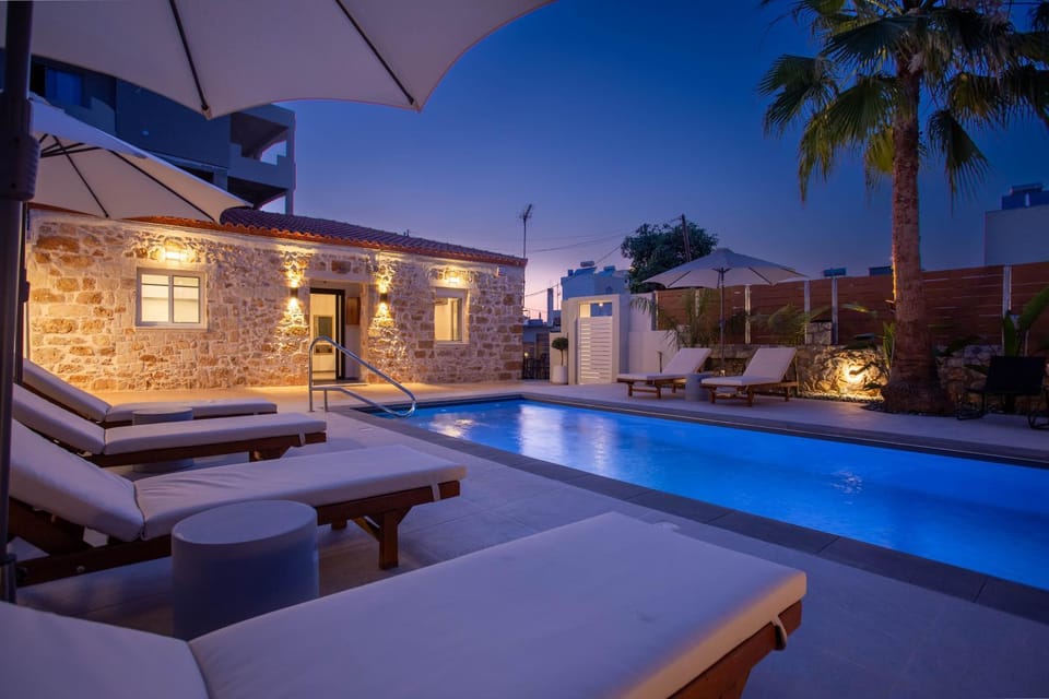 Property building, Night, Pool view, Swimming pool, sunbed