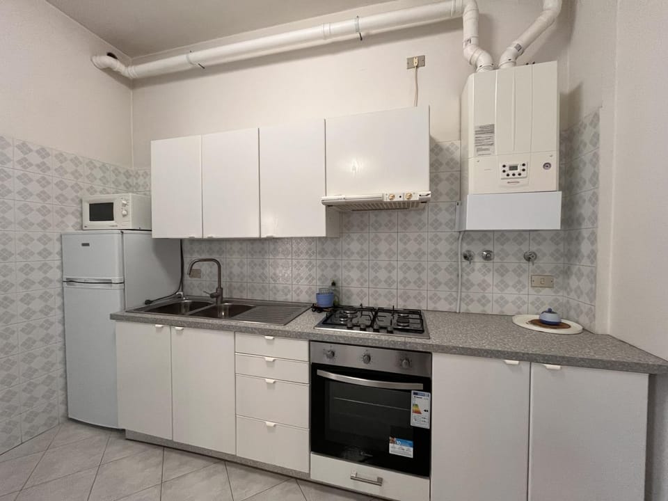 Kitchen or kitchenette, oven, stove