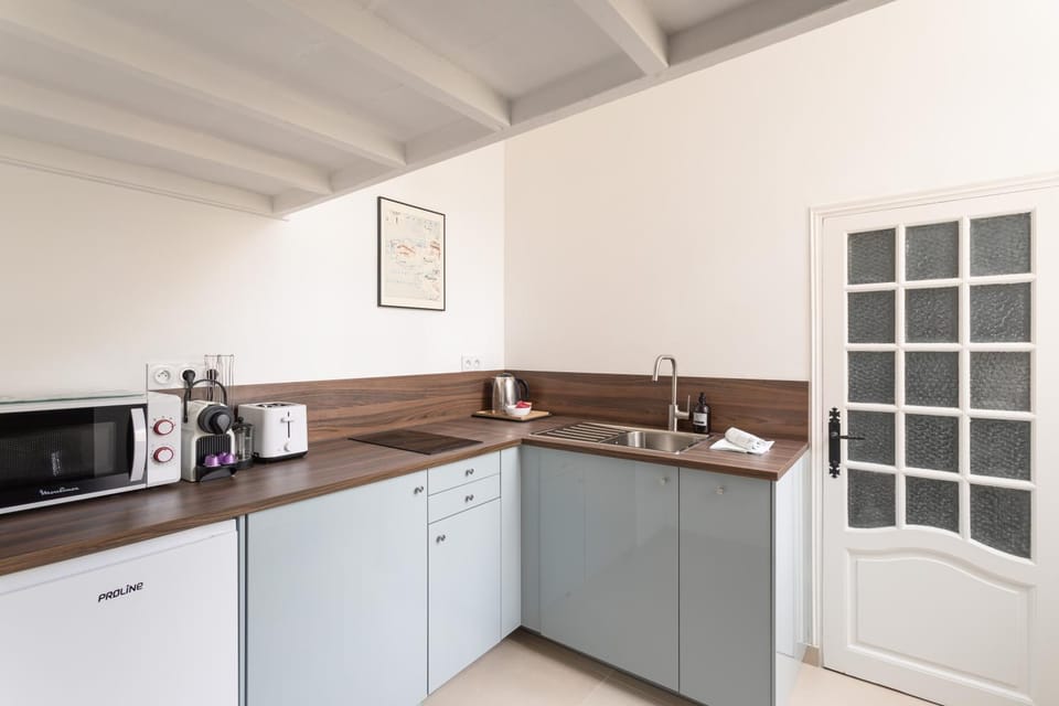 Kitchen or kitchenette, stove