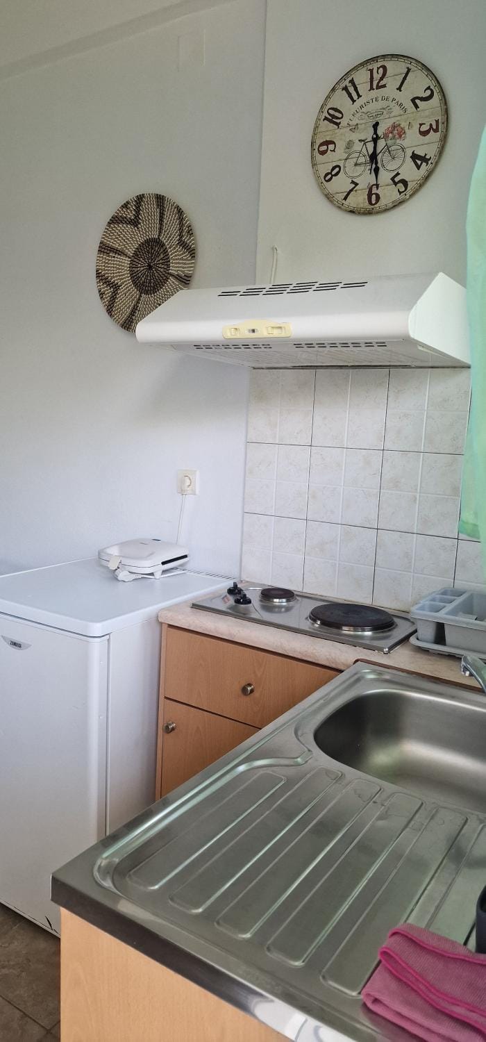 Kitchen or kitchenette, stove