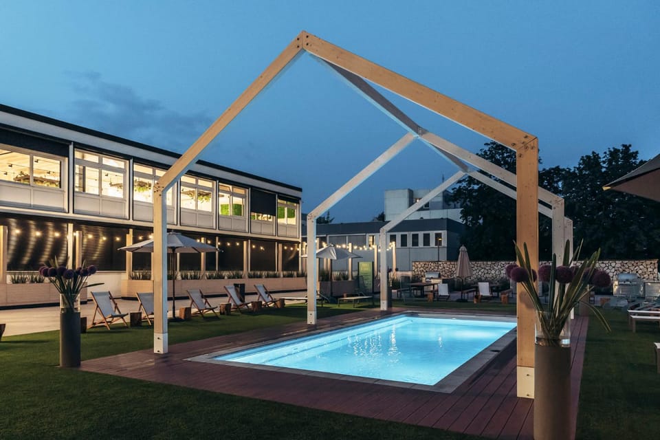 Property building, Patio, Pool view, Swimming pool, sunbed