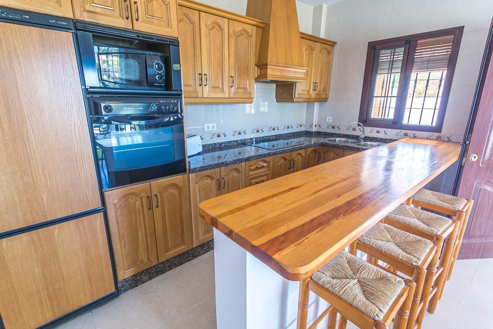 Kitchen or kitchenette, oven, stove