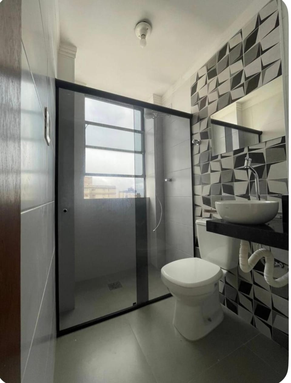 Apto com vista lateral para a praia Apartment in Santos