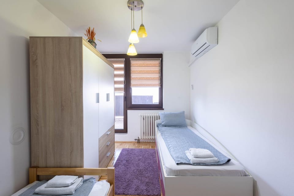 Bed, Bedroom, towels, wardrobe, air conditioner