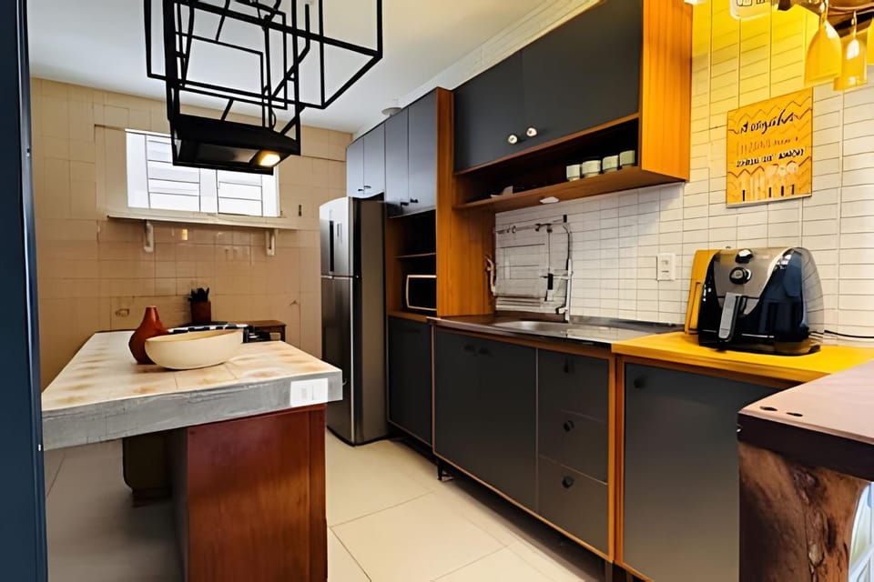 Kitchen or kitchenette, oven, stove, washing machine