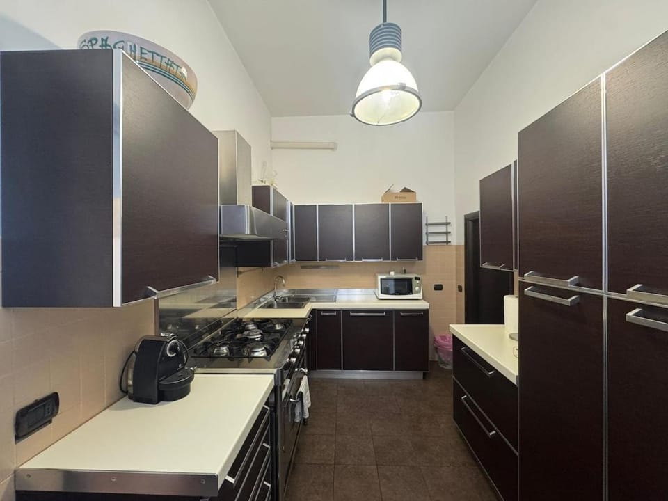 Kitchen or kitchenette, microwave, oven