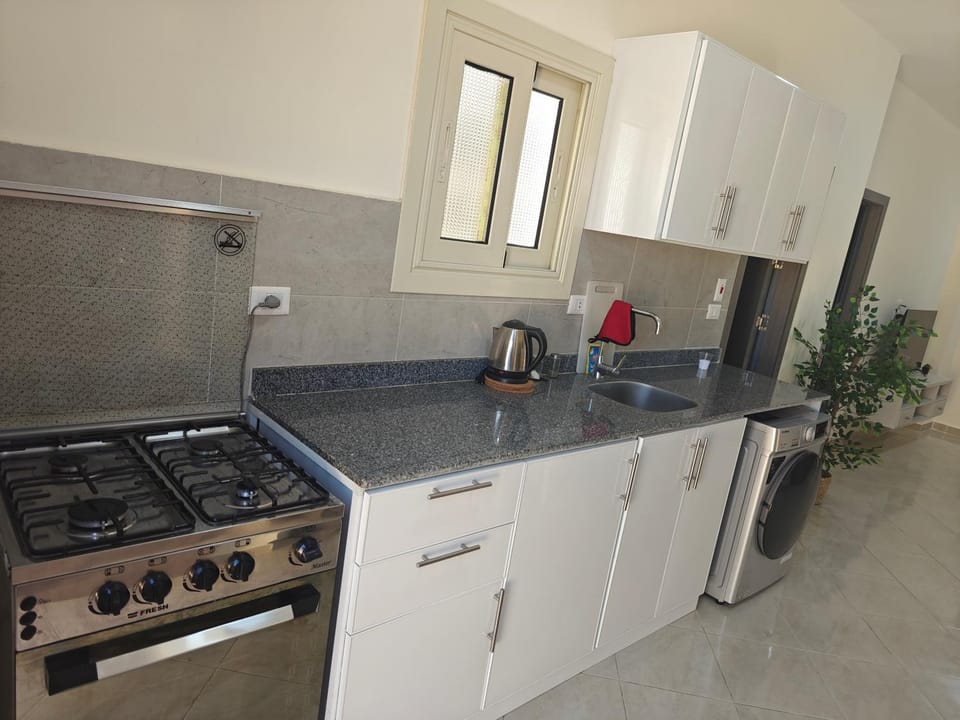Kitchen or kitchenette, oven, stove