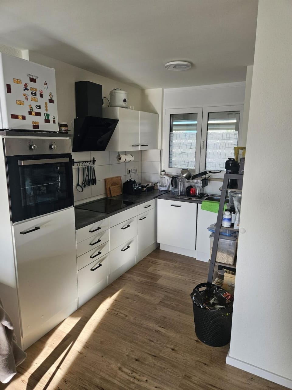 Kitchen or kitchenette, dishwasher, oven, stove