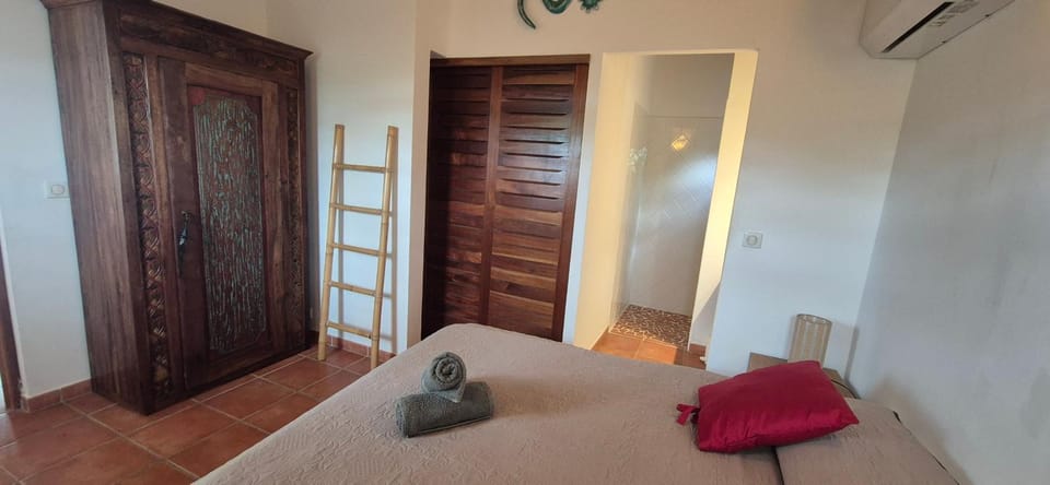 Bed, Bedroom, towels, wardrobe, air conditioner