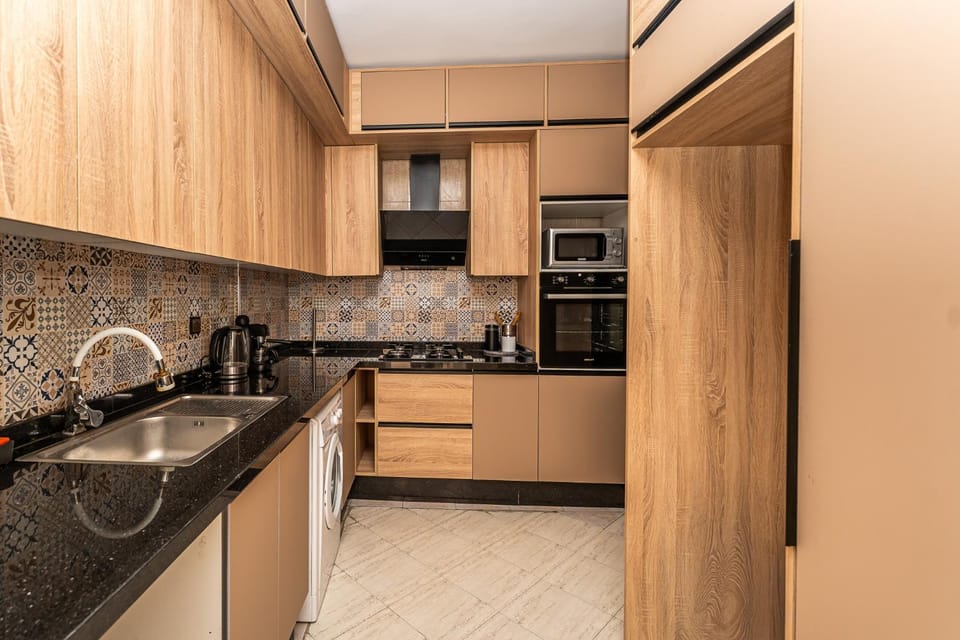 Kitchen or kitchenette, dishwasher, minibar, stove