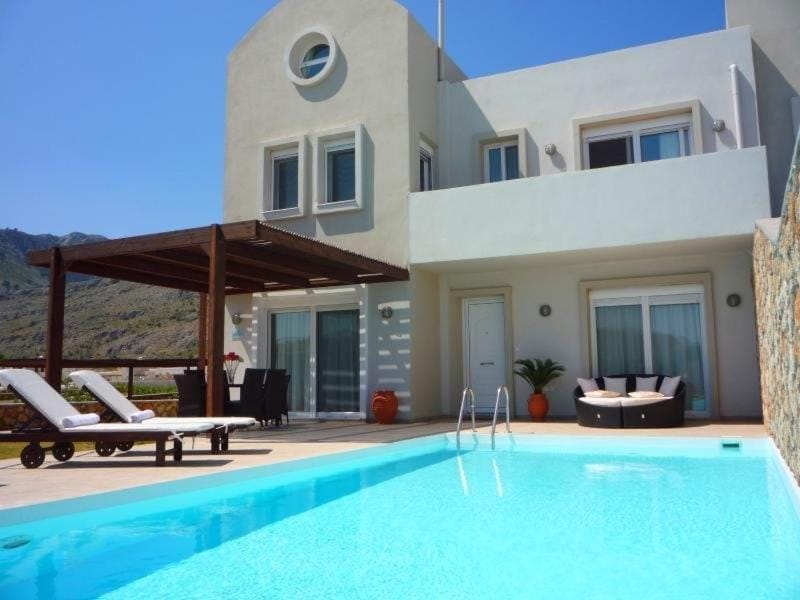 Property building, Patio, Natural landscape, Mountain view, Pool view, Swimming pool
