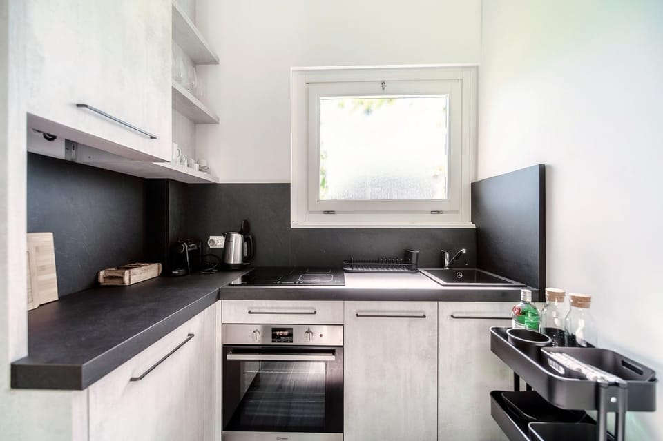 Kitchen or kitchenette, oven, stove