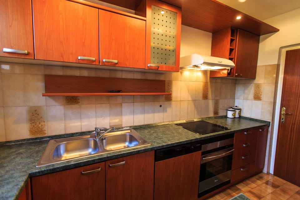 Kitchen or kitchenette, stove