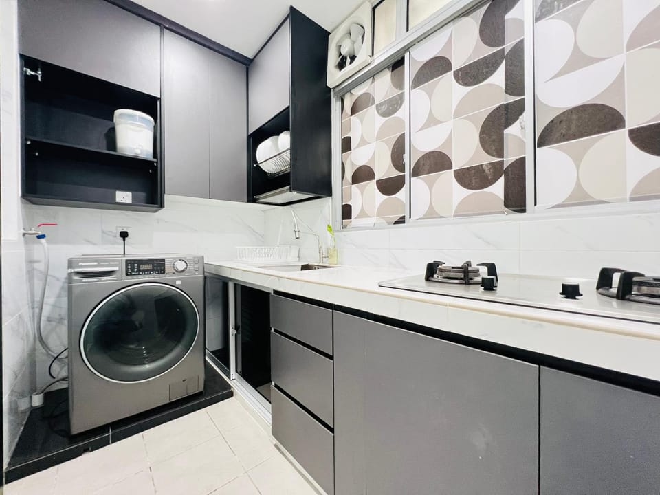 Kitchen or kitchenette, washing machine